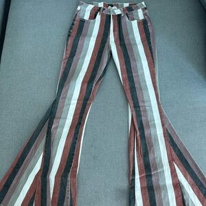 Bell bottomed jeans with neutral color stripes